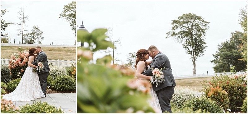 Premier Snohomish & Seattle Wedding Photographer | GSquared Weddings Photography A bride and groom share a kiss in a lush garden in Snohomish, surrounded by flowers and trees under the open sky. The bride holds a bouquet in her white dress, while the groom wears a gray suit—capturing a romantic Seattle wedding moment. 47.9129° N, 122.0982° W | Serving Snohomish, Seattle , Orlando & Beyond