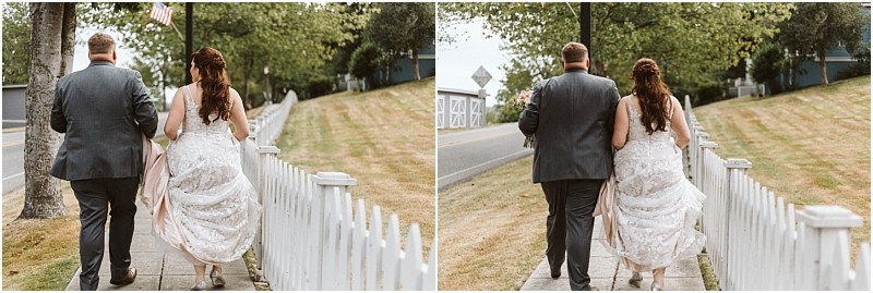 Premier Snohomish & Seattle Wedding Photographer | GSquared Weddings Photography A bride and groom walk side by side on a sidewalk next to a white picket fence, with trees and grass on both sides, photographed from behind on a cloudy Snohomish Seattle Wedding day. 47.9129° N, 122.0982° W | Serving Snohomish, Seattle , Orlando & Beyond