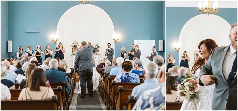 Premier Snohomish & Seattle Wedding Photographer | GSquared Weddings Photography A bride and groom walk joyfully down the aisle of a Snohomish church, smiling and holding hands, as seated guests and the wedding party look on and celebrate their beautiful Seattle wedding. 47.9129° N, 122.0982° W | Serving Snohomish, Seattle , Orlando & Beyond