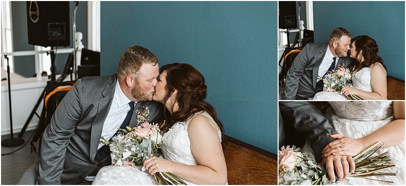 Premier Snohomish & Seattle Wedding Photographer | GSquared Weddings Photography A bride and groom in wedding attire share a kiss while sitting on a bench. The bride holds a bouquet, their hands gently touching in this close-up from a Snohomish Seattle wedding, set against a teal wall with speakers in the background. 47.9129° N, 122.0982° W | Serving Snohomish, Seattle , Orlando & Beyond