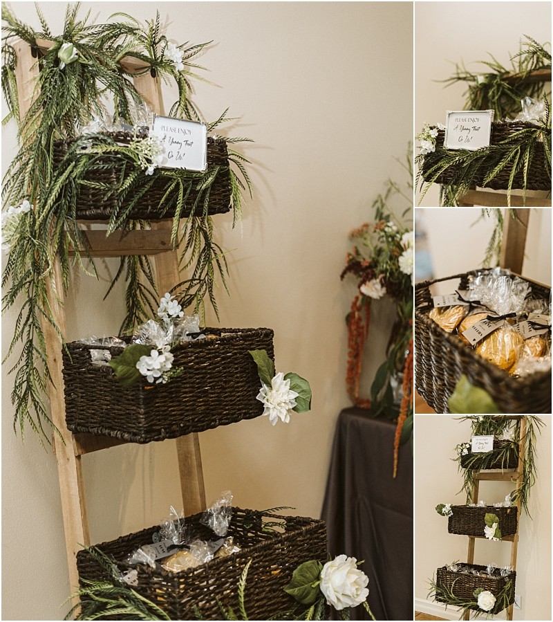 Premier Snohomish & Seattle Wedding Photographer | GSquared Weddings Photography A wooden ladder shelf at this Snohomish wedding displays wicker baskets filled with wrapped cookies, decorated with greenery and white flowers. A small sign on the top basket reads “Please take a bag to go!”. 47.9129° N, 122.0982° W | Serving Snohomish, Seattle , Orlando & Beyond