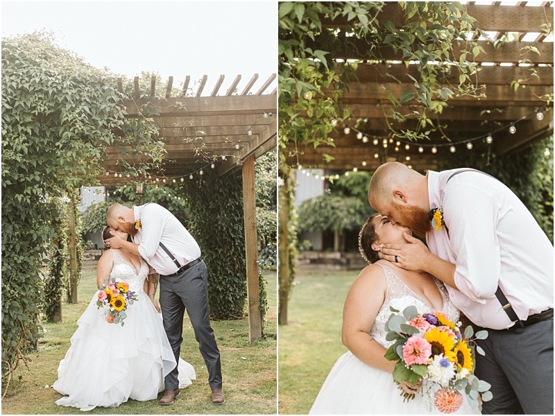Premier Snohomish & Seattle Wedding Photographer | GSquared Weddings Photography A newlywed couple shares a joyful kiss under a vine-covered pergola in Snohomish. The bride holds a colorful bouquet, and both are dressed in wedding attire, capturing a romantic moment at their Seattle wedding outdoors. 47.9129° N, 122.0982° W | Serving Snohomish, Seattle , Orlando & Beyond