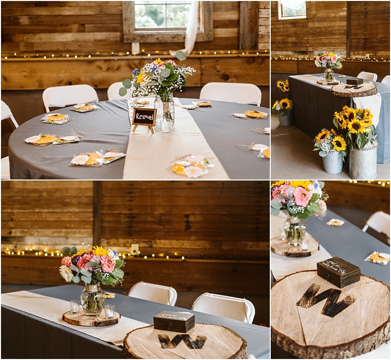Premier Snohomish & Seattle Wedding Photographer | GSquared Weddings Photography Rustic Snohomish Seattle wedding setup with round and rectangular tables, gray tablecloths, sunflowers, and vibrant flower centerpieces in jars, all inside a wooden barn adorned with string lights and natural wood accents. 47.9129° N, 122.0982° W | Serving Snohomish, Seattle , Orlando & Beyond