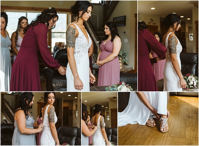 Premier Snohomish & Seattle Wedding Photographer | GSquared Weddings Photography A bride in a white dress gets ready with help from women in mauve and plum dresses for her Snohomish Seattle wedding. They adjust her gown and shoes in a warmly lit room with wood floors and comfortable furniture. 47.9129° N, 122.0982° W | Serving Snohomish, Seattle , Orlando & Beyond