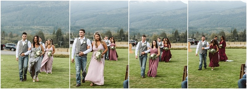 Premier Snohomish & Seattle Wedding Photographer | GSquared Weddings Photography A sequence of outdoor Snohomish wedding photos shows bridesmaids in mauve dresses and groomsmen in vests and jeans walking arm-in-arm across a grassy field with mountains in the background. 47.9129° N, 122.0982° W | Serving Snohomish, Seattle , Orlando & Beyond
