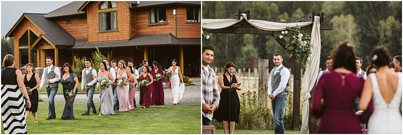 Premier Snohomish & Seattle Wedding Photographer | GSquared Weddings Photography A bridal party walks across a lawn toward a flower-adorned wooden arch, where the groom and guests await. The outdoor Snohomish setting near a large rustic-style house offers a charming backdrop for this Seattle wedding moment. 47.9129° N, 122.0982° W | Serving Snohomish, Seattle , Orlando & Beyond