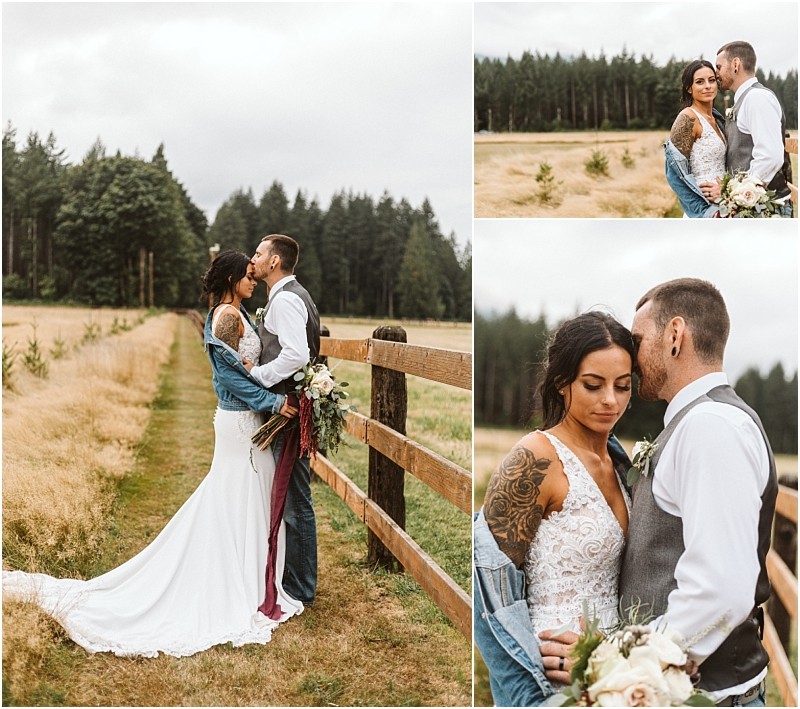 Premier Snohomish & Seattle Wedding Photographer | GSquared Weddings Photography A bride and groom stand close together outdoors by a wooden fence in a grassy field, surrounded by trees. Capturing a relaxed Snohomish Seattle wedding vibe, they look lovingly at each other—the bride in white dress and denim jacket, the groom in vest and jeans. 47.9129° N, 122.0982° W | Serving Snohomish, Seattle , Orlando & Beyond