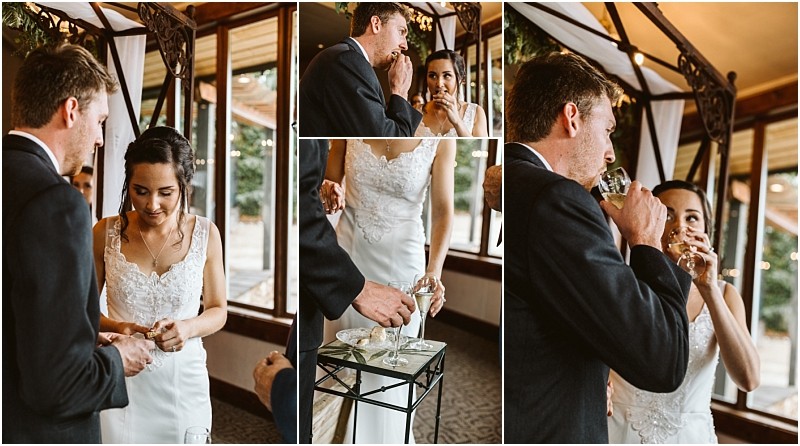 Premier Snohomish & Seattle Wedding Photographer | GSquared Weddings Photography A bride and groom participate in a Snohomish Seattle wedding ritual, exchanging rings and sipping from glasses as they stand together indoors near a glass table with two wine glasses, both dressed in formal wedding attire. 47.9129° N, 122.0982° W | Serving Snohomish, Seattle , Orlando & Beyond
