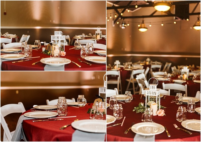 Premier Snohomish & Seattle Wedding Photographer | GSquared Weddings Photography Tables set for a Snohomish wedding or Seattle engagement, featuring red tablecloths, white plates, mason jar glasses, gold utensils, and white lantern centerpieces with greenery and pink flowers; warm lighting in the background. 47.9129° N, 122.0982° W | Serving Snohomish, Seattle , Orlando & Beyond