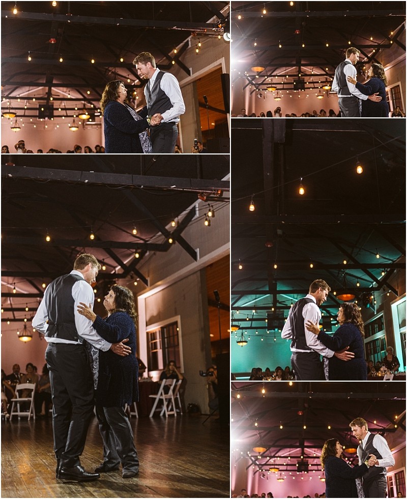 Premier Snohomish & Seattle Wedding Photographer | GSquared Weddings Photography At a Snohomish wedding, a man in formal attire dances with an older woman at a warmly lit indoor event. String lights hang from the ceiling as guests watch from seated tables in the background. 47.9129° N, 122.0982° W | Serving Snohomish, Seattle , Orlando & Beyond