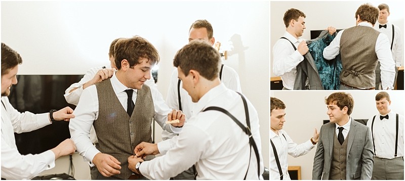 Premier Snohomish & Seattle Wedding Photographer | GSquared Weddings Photography Three men help another man in a vest and tie get dressed for a Snohomish Seattle wedding; they adjust his vest and jacket in a bright room, all smiling and wearing dress shirts and bow ties. 47.9129° N, 122.0982° W | Serving Snohomish, Seattle , Orlando & Beyond