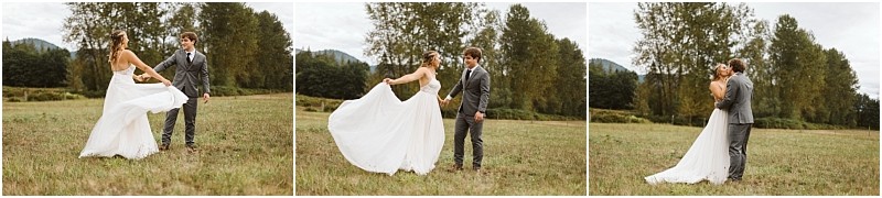 Premier Snohomish & Seattle Wedding Photographer | GSquared Weddings Photography A bride in a flowing white dress and a groom in a grey suit dance and embrace in a grassy field, surrounded by trees and hills, capturing the romance of a Snohomish Seattle wedding. 47.9129° N, 122.0982° W | Serving Snohomish, Seattle , Orlando & Beyond