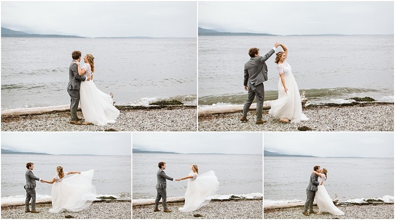 Premier Snohomish & Seattle Wedding Photographer | GSquared Weddings Photography A couple in wedding attire dances and twirls joyfully on a rocky beach near the water, with mountains visible in the distance under a cloudy sky—capturing the magic of a Snohomish Seattle wedding engagement. 47.9129° N, 122.0982° W | Serving Snohomish, Seattle , Orlando & Beyond