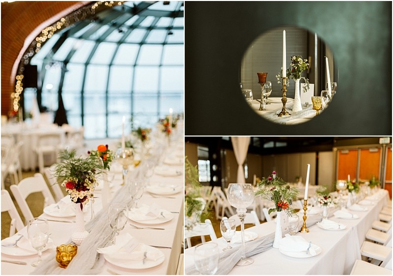 Premier Snohomish & Seattle Wedding Photographer | GSquared Weddings Photography Elegant wedding reception setup in a bright, modern venue near Snohomish Seattle, with long white tables adorned with vintage gold candlesticks, glassware, white plates, and floral centerpieces featuring greenery and red accents—perfect for an engagement celebration. 47.9129° N, 122.0982° W | Serving Snohomish, Seattle , Orlando & Beyond