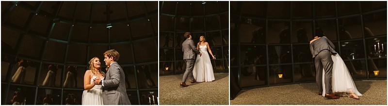 Premier Snohomish & Seattle Wedding Photographer | GSquared Weddings Photography A couple in wedding attire share a dance in a dimly lit Snohomish venue with large, dark windows reflecting their image. They smile, dance, and embrace as newlyweds on their special night near Seattle. 47.9129° N, 122.0982° W | Serving Snohomish, Seattle , Orlando & Beyond