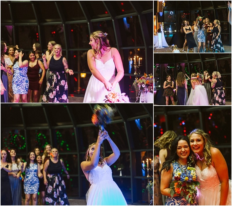 Premier Snohomish & Seattle Wedding Photographer | GSquared Weddings Photography A bride in a white dress tosses her bouquet to a group of smiling women at a lively, colorful Snohomish Seattle wedding; one catches it, and they all celebrate together in the joyful indoor setting. 47.9129° N, 122.0982° W | Serving Snohomish, Seattle , Orlando & Beyond