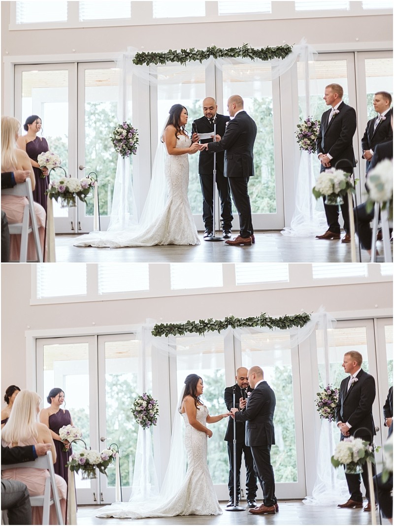 Premier Snohomish & Seattle Wedding Photographer | GSquared Weddings Photography A bride and groom stand facing each other at their Snohomish wedding ceremony, exchanging vows as an officiant speaks. Bridesmaids and groomsmen stand nearby, with sunlight streaming through large windows behind them. 47.9129° N, 122.0982° W | Serving Snohomish, Seattle , Orlando & Beyond