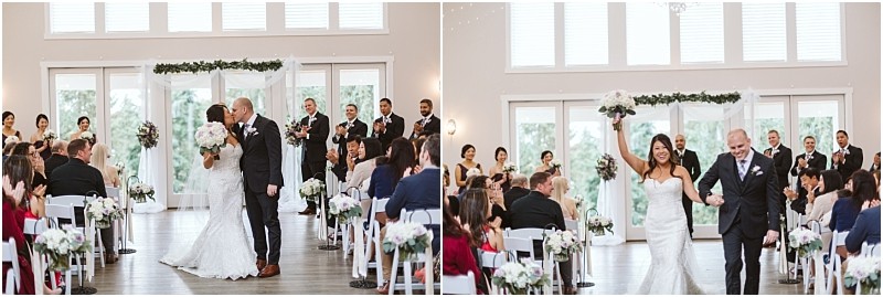 Premier Snohomish & Seattle Wedding Photographer | GSquared Weddings Photography A bride and groom share a kiss at the altar, then walk back down the aisle smiling as guests in white chairs clap and celebrate in a bright, modern Snohomish wedding venue decorated with flowers. 47.9129° N, 122.0982° W | Serving Snohomish, Seattle , Orlando & Beyond