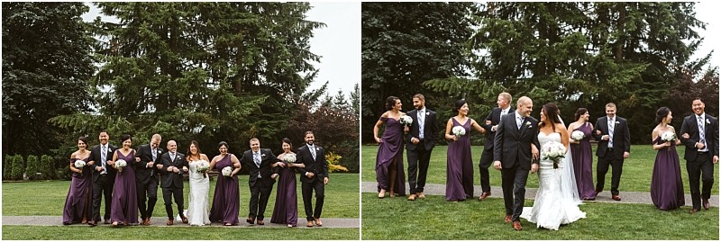 Premier Snohomish & Seattle Wedding Photographer | GSquared Weddings Photography A joyful Snohomish wedding party poses outdoors on grass, with bridesmaids in purple dresses and groomsmen in black suits walking arm in arm with the bride and groom, framed by tall evergreen trees. 47.9129° N, 122.0982° W | Serving Snohomish, Seattle , Orlando & Beyond