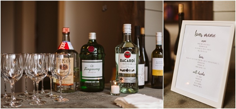 Premier Snohomish & Seattle Wedding Photographer | GSquared Weddings Photography A selection of liquor bottles, wine, and empty glasses are arranged on a counter at this Snohomish wedding. Next to them is a framed bar menu listing available drinks, along with a small candle and a stack of napkins. 47.9129° N, 122.0982° W | Serving Snohomish, Seattle , Orlando & Beyond