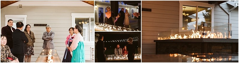 Premier Snohomish & Seattle Wedding Photographer | GSquared Weddings Photography A group of people in formal attire stand and chat around a rectangular outdoor fire pit near a house, both during the day and at night, with flames visible behind a glass barrier at a Snohomish Seattle wedding engagement. 47.9129° N, 122.0982° W | Serving Snohomish, Seattle , Orlando & Beyond