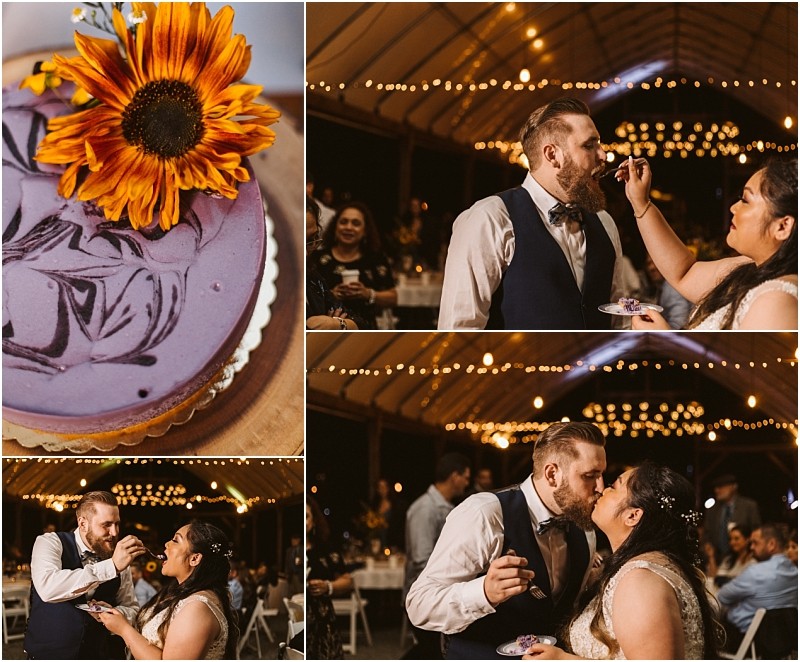 Premier Snohomish & Seattle Wedding Photographer | GSquared Weddings Photography At their Snohomish wedding, a couple shares cake and a kiss in a warmly lit venue. The purple cake with a sunflower on top delights guests as the couple feeds each other and celebrates their Seattle engagement. 47.9129° N, 122.0982° W | Serving Snohomish, Seattle , Orlando & Beyond