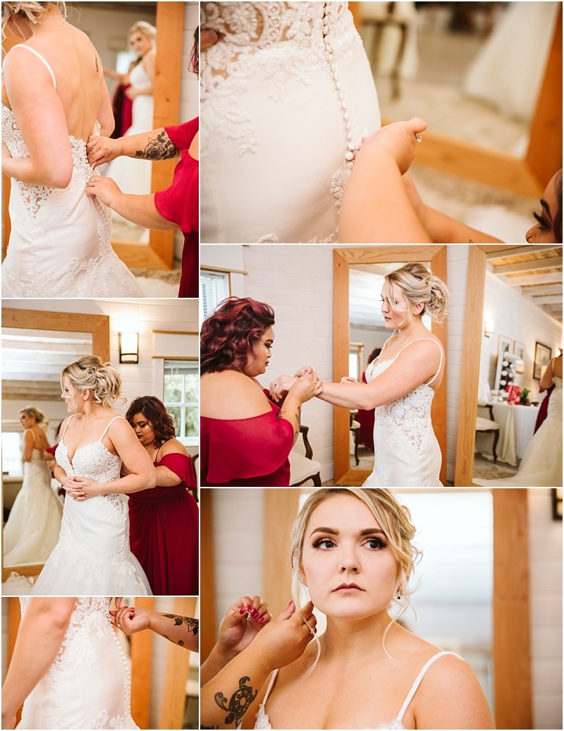 Premier Snohomish & Seattle Wedding Photographer | GSquared Weddings Photography A bride in a white lace wedding dress gets ready with help from bridesmaids in red dresses for her Snohomish Seattle wedding; they fasten her dress, adjust jewelry, and assist with final touches as she prepares for her big day. 47.9129° N, 122.0982° W | Serving Snohomish, Seattle , Orlando & Beyond