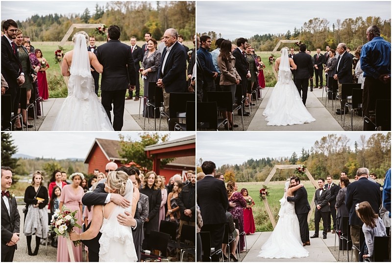 Premier Snohomish & Seattle Wedding Photographer | GSquared Weddings Photography A bride in a white gown walks down the outdoor aisle at this Snohomish wedding, then hugs her groom at the altar, surrounded by standing guests and a green, scenic backdrop. Four photos capture heartfelt moments of the ceremony. 47.9129° N, 122.0982° W | Serving Snohomish, Seattle , Orlando & Beyond