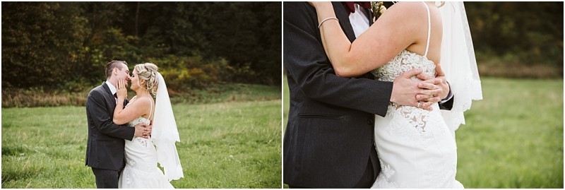 Premier Snohomish & Seattle Wedding Photographer | GSquared Weddings Photography A bride and groom embrace and kiss outdoors in a grassy Snohomish field, with trees in the background. The bride wears a white gown and veil, while the groom is in a dark suit—capturing a romantic Seattle wedding moment. 47.9129° N, 122.0982° W | Serving Snohomish, Seattle , Orlando & Beyond