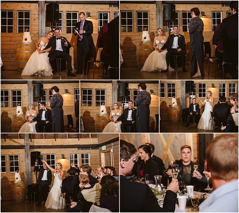 Premier Snohomish & Seattle Wedding Photographer | GSquared Weddings Photography A bride and groom sit together at their Snohomish wedding reception while guests give toasts; attendees raise glasses and celebrate in a rustic, wood-paneled venue decorated with wine barrels near Seattle. 47.9129° N, 122.0982° W | Serving Snohomish, Seattle , Orlando & Beyond