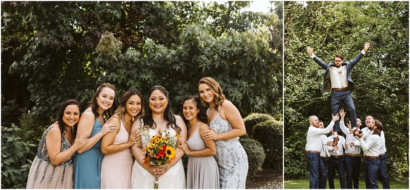 Premier Snohomish & Seattle Wedding Photographer | GSquared Weddings Photography A bride in a white dress holds a sunflower bouquet, surrounded by five smiling bridesmaids in pastel dresses. Nearby, six groomsmen lift one man joyfully into the air—capturing pure joy at this charming Snohomish Seattle wedding outdoors among green trees. 47.9129° N, 122.0982° W | Serving Snohomish, Seattle , Orlando & Beyond