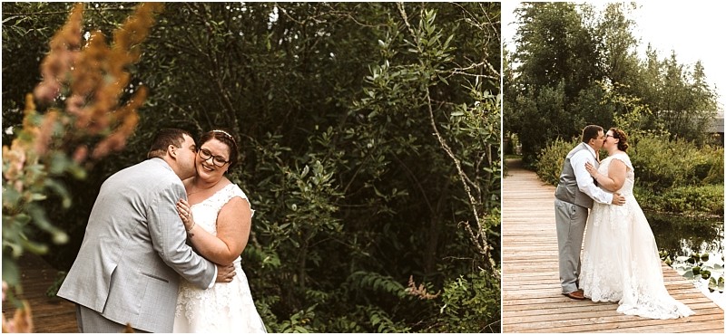 Premier Snohomish & Seattle Wedding Photographer | GSquared Weddings Photography A bride and groom in wedding attire embrace and smile outdoors on a wooden walkway surrounded by lush green trees—capturing a romantic Snohomish Seattle wedding moment. The bride wears a white gown; the groom wears a light suit. 47.9129° N, 122.0982° W | Serving Snohomish, Seattle , Orlando & Beyond