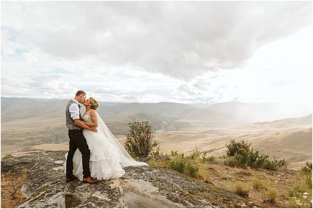 couple on a mountain top in methow washington after their small wedding