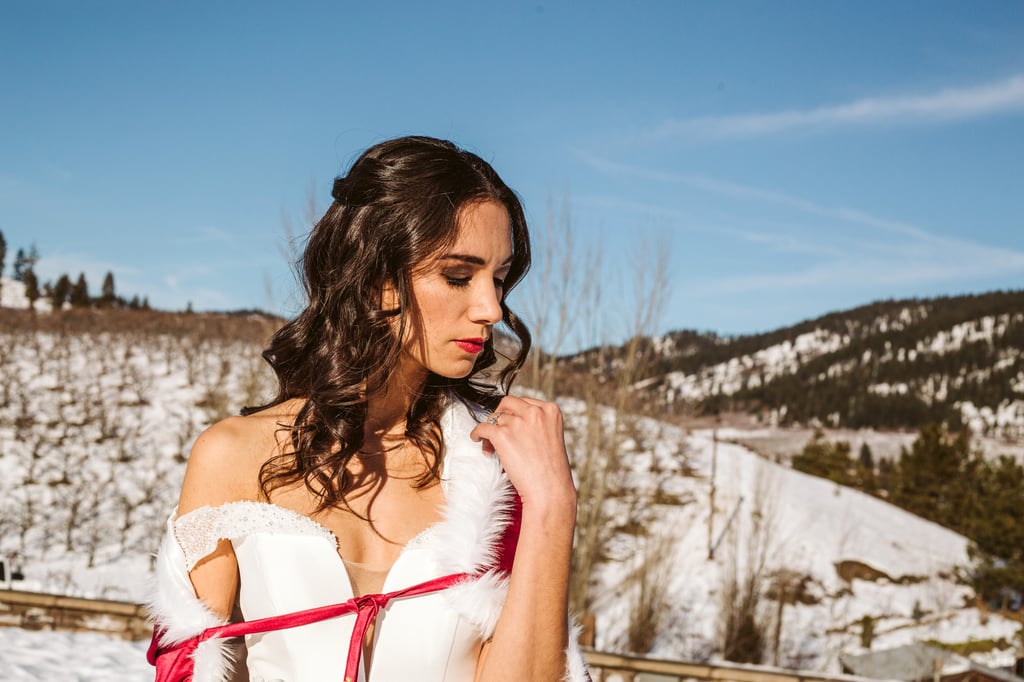 leavenworth wedding inspired by Belle of beauty and the beast bride in red winter cape at silvara winery vineyards