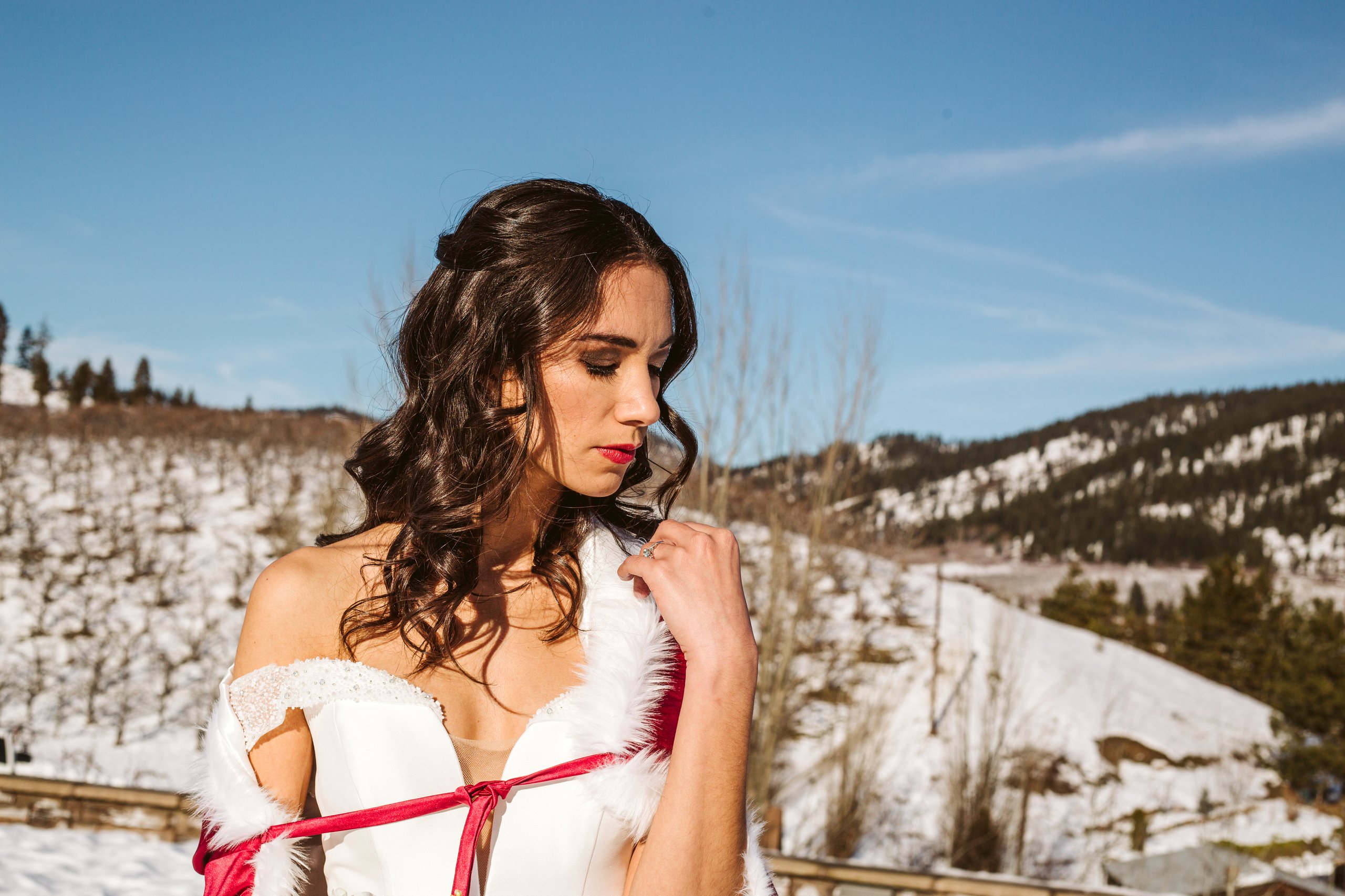leavenworth wedding inspired by Belle of beauty and the beast bride in red winter cape at silvara winery vineyards