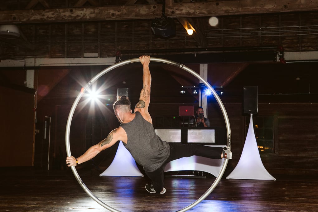 wedding reception performance artist cyr ring dancer