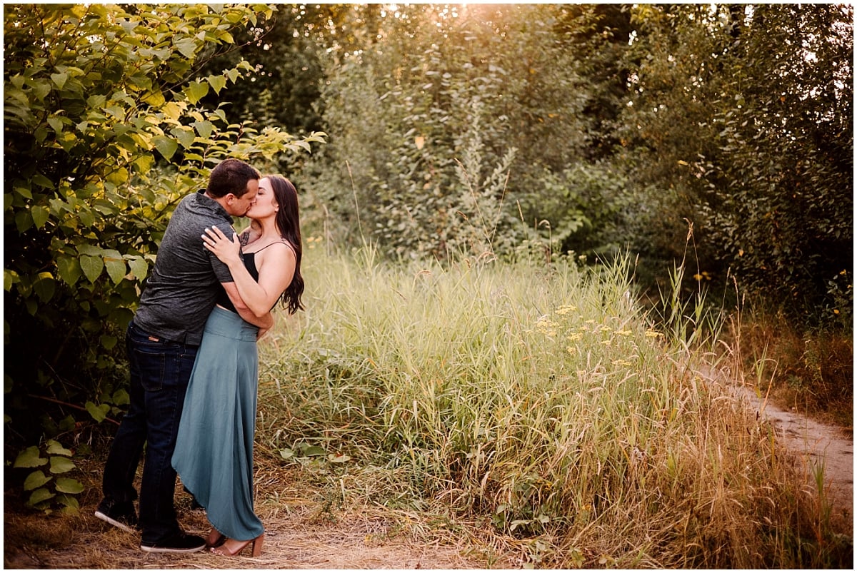 machias engagement session in the tall grass near the pilchuck river off dubuque rd