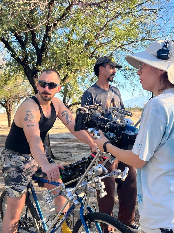 Film crew with professional camera equipment on location