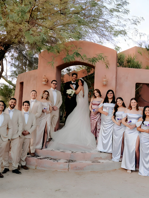 Wedding couple walking through property