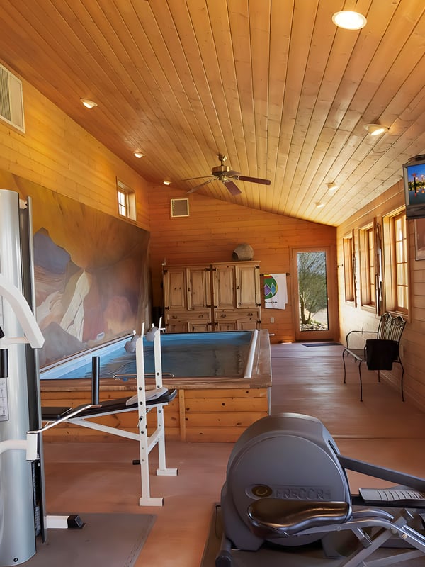 Fully equipped fitness center with hot tub