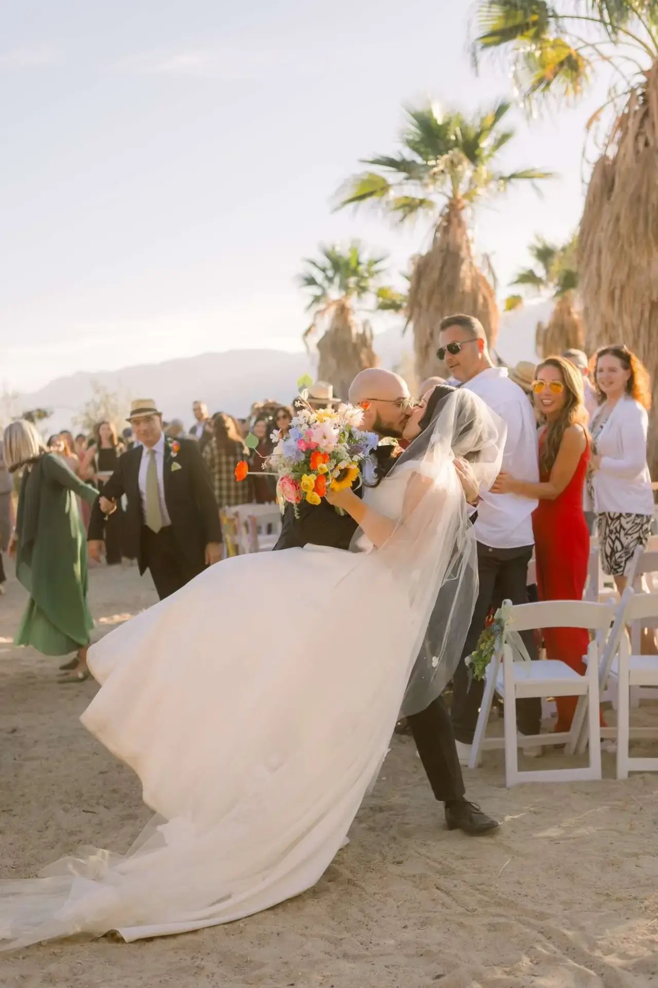 Outdoor wedding ceremony surrounded by desert landscape