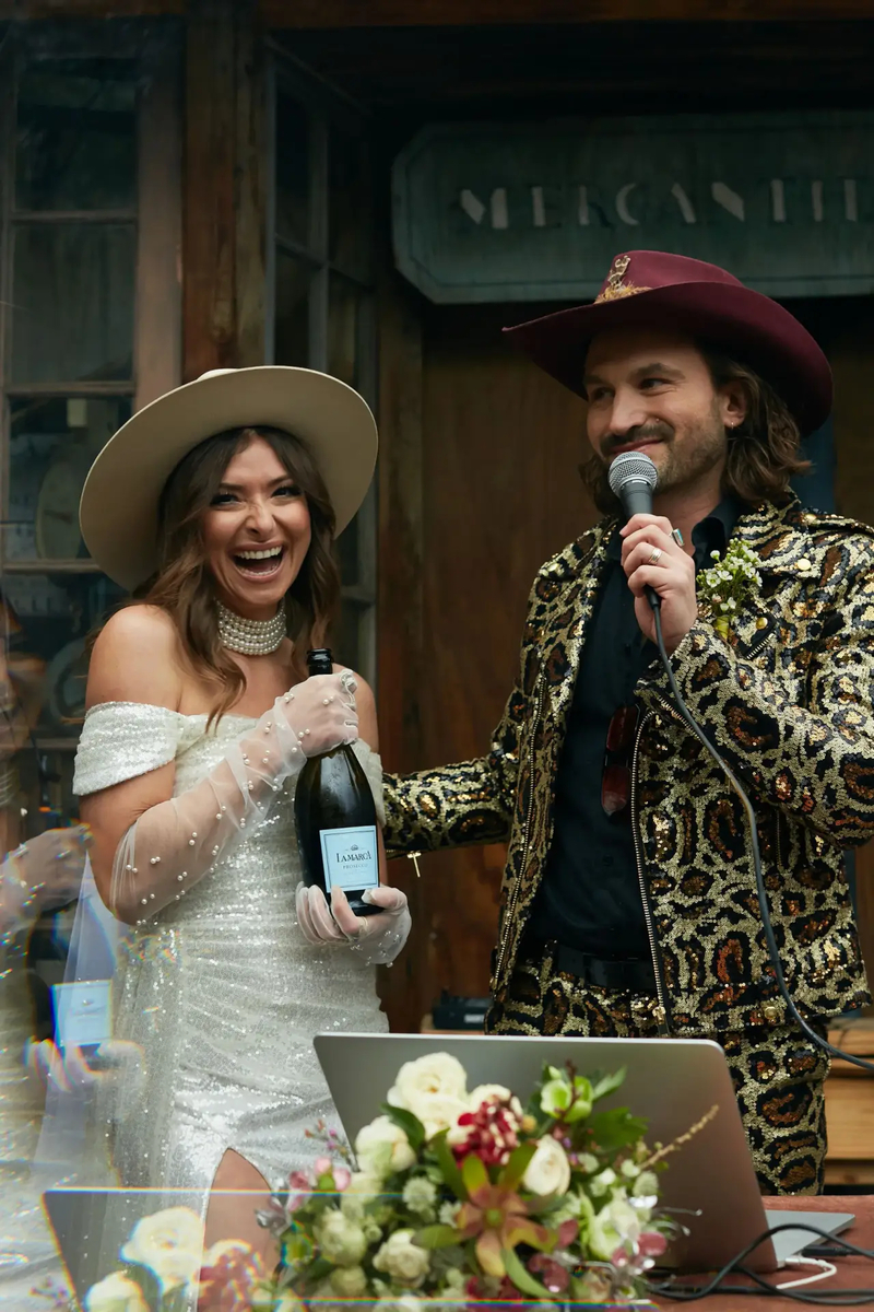 Champagne toast at a desert wedding reception
