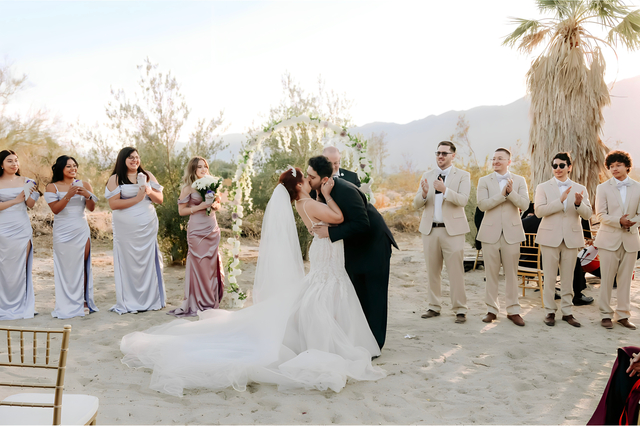 Bride and groom's first kiss at Desert Hot Springs wedding ceremony