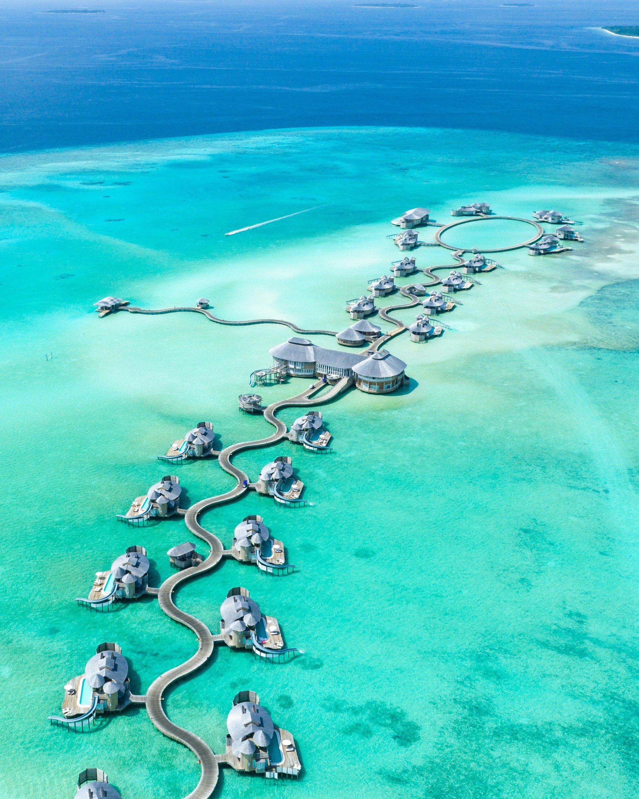Water villa overwater Maldives, snorkeling reef, sunset cruise