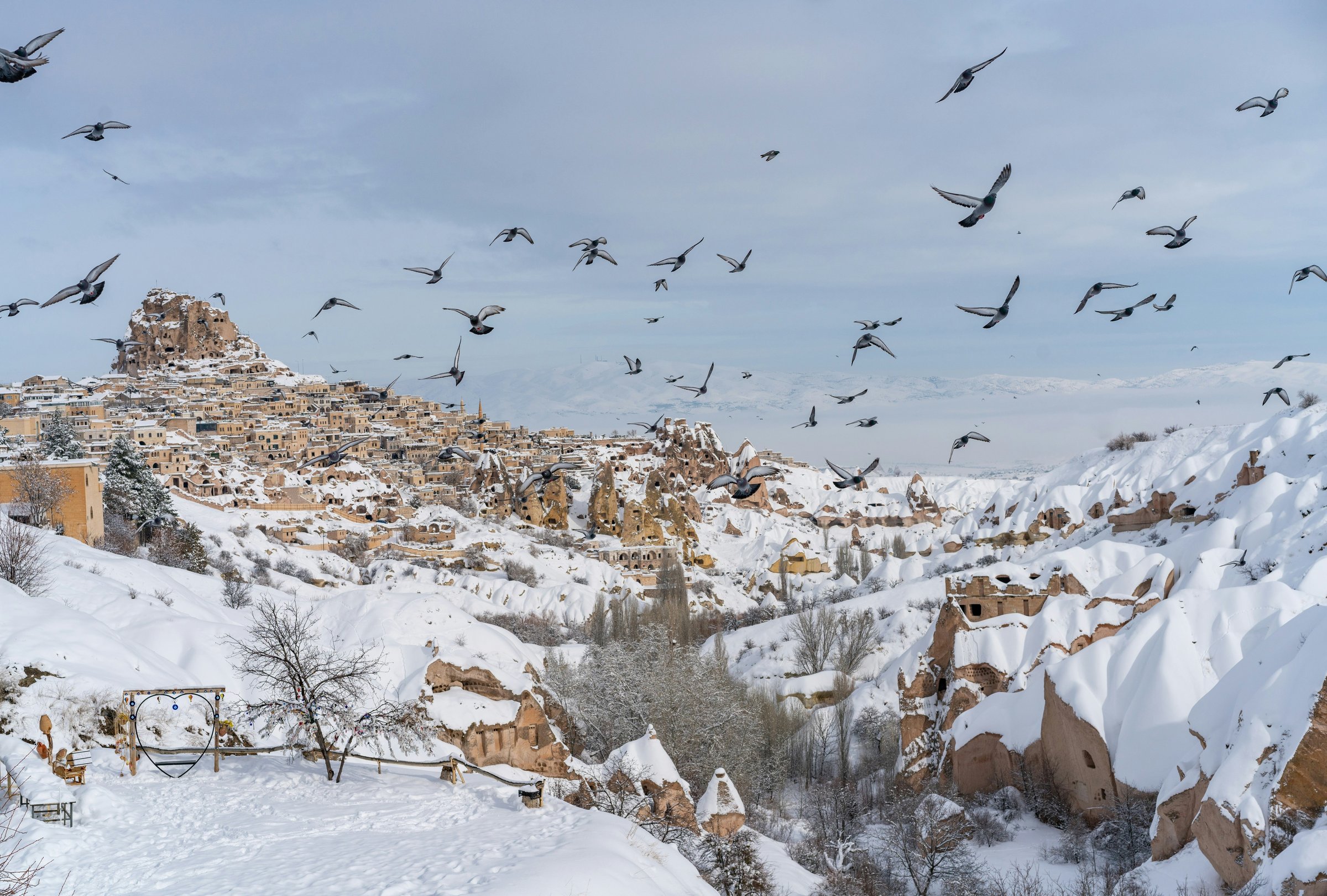 Cappadocia winter snow chimney rocks