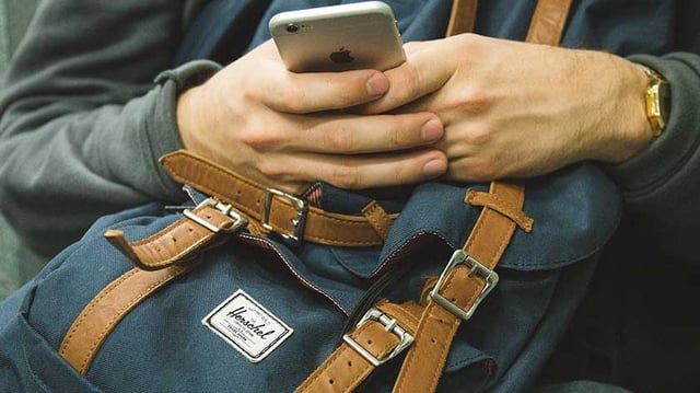 Man using smart phone