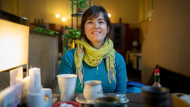 Cristina at a cafe in Japan
