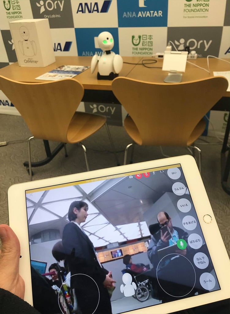 Disabled user operating a robot