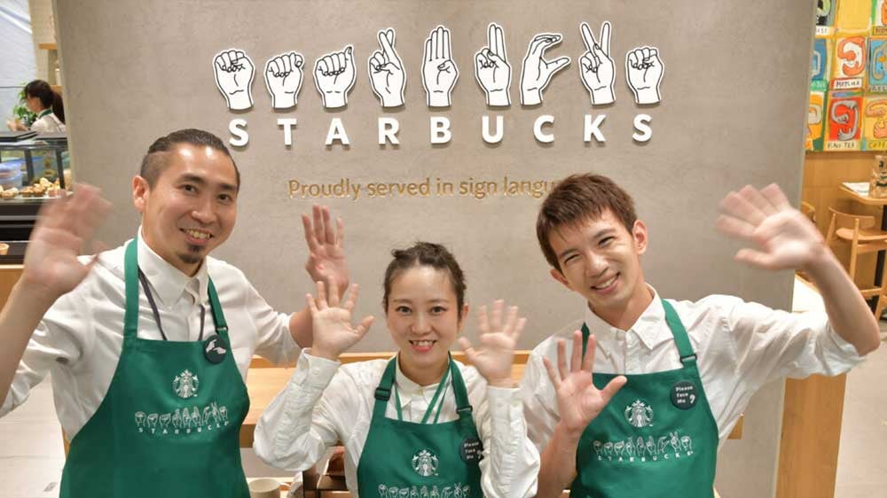 Staff at sign language Starbucks in Japan