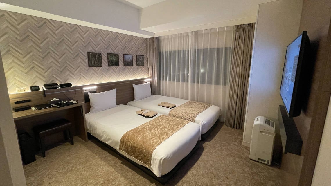 Twin beds with room to transfer on one side